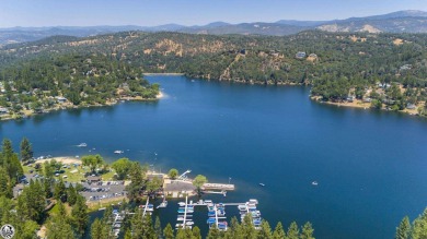 Enjoy serene views of the ridgeline through the pines and cedars on Pine Mountain Lake Country Club in California - for sale on GolfHomes.com, golf home, golf lot