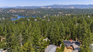 Enjoy serene views of the ridgeline through the pines and cedars on Pine Mountain Lake Country Club in California - for sale on GolfHomes.com, golf home, golf lot