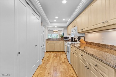 Move right into to this light and airy Carriedale cottage. A on Fiddlesticks Country Club in Florida - for sale on GolfHomes.com, golf home, golf lot