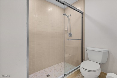 Move right into to this light and airy Carriedale cottage. A on Fiddlesticks Country Club in Florida - for sale on GolfHomes.com, golf home, golf lot