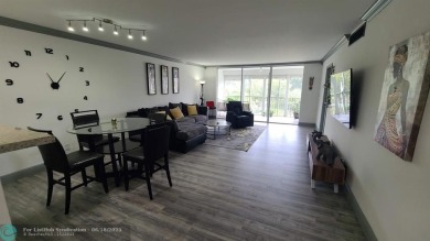 Experience South Florida living in this beautifully renovated on Palm-Aire Country Club and Resort - Palms in Florida - for sale on GolfHomes.com, golf home, golf lot