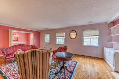 Experience refined living in this exceptional five-bedroom on Country Club of Bristol in Tennessee - for sale on GolfHomes.com, golf home, golf lot