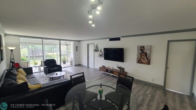 Experience South Florida living in this beautifully renovated on Palm-Aire Country Club and Resort - Palms in Florida - for sale on GolfHomes.com, golf home, golf lot