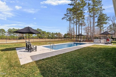 Very rare opportunity to experience resort-style living in this on Hasentree Club in North Carolina - for sale on GolfHomes.com, golf home, golf lot