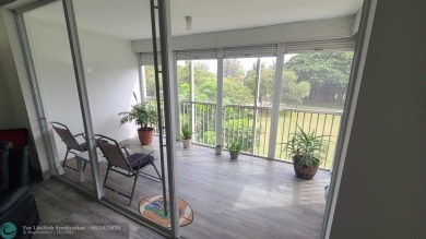 Experience South Florida living in this beautifully renovated on Palm-Aire Country Club and Resort - Palms in Florida - for sale on GolfHomes.com, golf home, golf lot