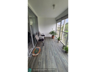 Experience South Florida living in this beautifully renovated on Palm-Aire Country Club and Resort - Palms in Florida - for sale on GolfHomes.com, golf home, golf lot