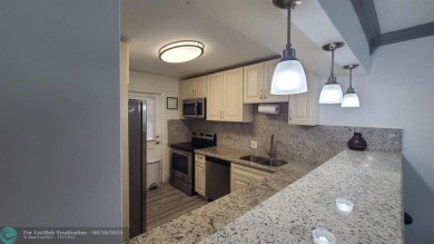 Experience South Florida living in this beautifully renovated on Palm-Aire Country Club and Resort - Palms in Florida - for sale on GolfHomes.com, golf home, golf lot