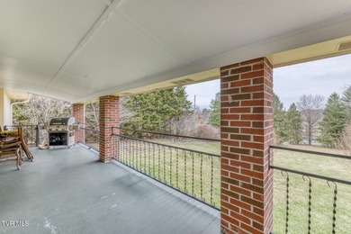 Experience refined living in this exceptional five-bedroom on Country Club of Bristol in Tennessee - for sale on GolfHomes.com, golf home, golf lot