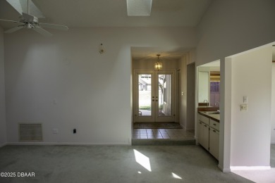 A 2 Bedroom with a Den/2 Bath end unit in the Woodside on Spruce Creek Golf Club in Florida - for sale on GolfHomes.com, golf home, golf lot