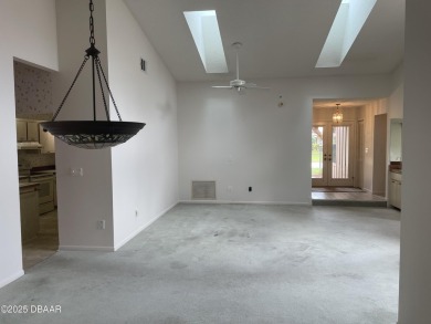 A 2 Bedroom with a Den/2 Bath end unit in the Woodside on Spruce Creek Golf Club in Florida - for sale on GolfHomes.com, golf home, golf lot
