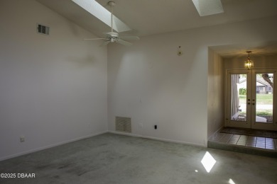 A 2 Bedroom with a Den/2 Bath end unit in the Woodside on Spruce Creek Golf Club in Florida - for sale on GolfHomes.com, golf home, golf lot