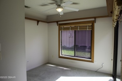 A 2 Bedroom with a Den/2 Bath end unit in the Woodside on Spruce Creek Golf Club in Florida - for sale on GolfHomes.com, golf home, golf lot