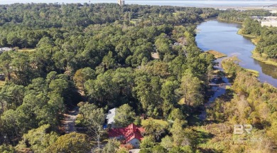 This beautifully updated home, with potential for four bedrooms on Lake Forest Yacht and Country Club in Alabama - for sale on GolfHomes.com, golf home, golf lot