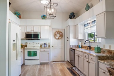 MUST SEE spacious, updated home near Spanish Springs and Lake on Hacienda Hills Golf and Country Club in Florida - for sale on GolfHomes.com, golf home, golf lot