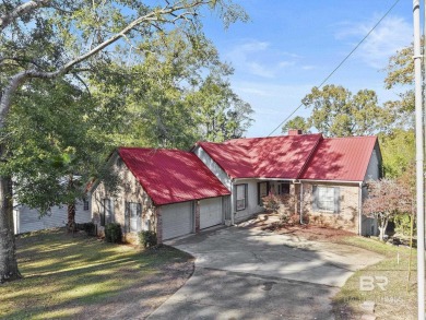 This beautifully updated home, with potential for four bedrooms on Lake Forest Yacht and Country Club in Alabama - for sale on GolfHomes.com, golf home, golf lot