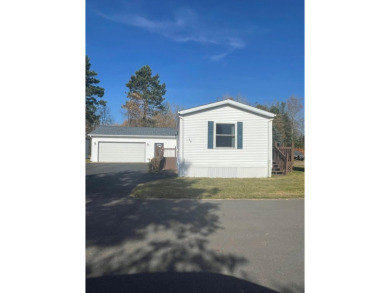 Don't miss your chance for this 2 bedroom, 2 bath mobile home on Rhinelander Country Club in Wisconsin - for sale on GolfHomes.com, golf home, golf lot