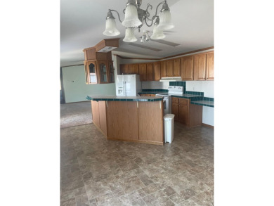 Don't miss your chance for this 2 bedroom, 2 bath mobile home on Rhinelander Country Club in Wisconsin - for sale on GolfHomes.com, golf home, golf lot