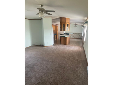 Don't miss your chance for this 2 bedroom, 2 bath mobile home on Rhinelander Country Club in Wisconsin - for sale on GolfHomes.com, golf home, golf lot