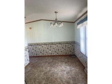 Don't miss your chance for this 2 bedroom, 2 bath mobile home on Rhinelander Country Club in Wisconsin - for sale on GolfHomes.com, golf home, golf lot