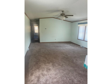 Don't miss your chance for this 2 bedroom, 2 bath mobile home on Rhinelander Country Club in Wisconsin - for sale on GolfHomes.com, golf home, golf lot