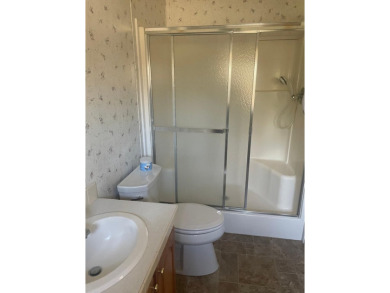 Don't miss your chance for this 2 bedroom, 2 bath mobile home on Rhinelander Country Club in Wisconsin - for sale on GolfHomes.com, golf home, golf lot