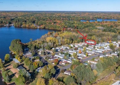 Don't miss your chance for this 2 bedroom, 2 bath mobile home on Rhinelander Country Club in Wisconsin - for sale on GolfHomes.com, golf home, golf lot