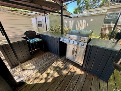 NEW LISTING! STUNNING 3 BED/2 BATH RAISED BEACH HOUSE WITH TONS on Prestwick Country Club in South Carolina - for sale on GolfHomes.com, golf home, golf lot