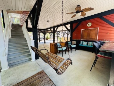 NEW LISTING! STUNNING 3 BED/2 BATH RAISED BEACH HOUSE WITH TONS on Prestwick Country Club in South Carolina - for sale on GolfHomes.com, golf home, golf lot