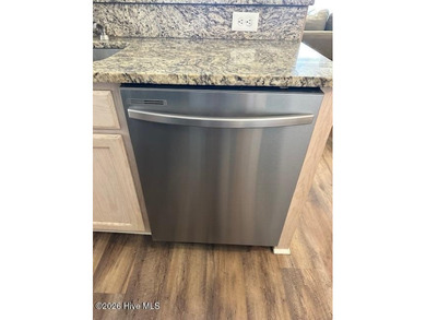 Spacious, fully furnished 2BR/2BA second-floor center-unit condo on Brunswick Plantation and Golf Resorts in North Carolina - for sale on GolfHomes.com, golf home, golf lot