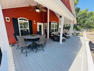 NEW LISTING! STUNNING 3 BED/2 BATH RAISED BEACH HOUSE WITH TONS on Prestwick Country Club in South Carolina - for sale on GolfHomes.com, golf home, golf lot