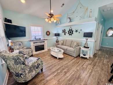 NEW LISTING! STUNNING 3 BED/2 BATH RAISED BEACH HOUSE WITH TONS on Prestwick Country Club in South Carolina - for sale on GolfHomes.com, golf home, golf lot