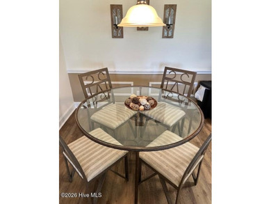 Spacious, fully furnished 2BR/2BA second-floor center-unit condo on Brunswick Plantation and Golf Resorts in North Carolina - for sale on GolfHomes.com, golf home, golf lot