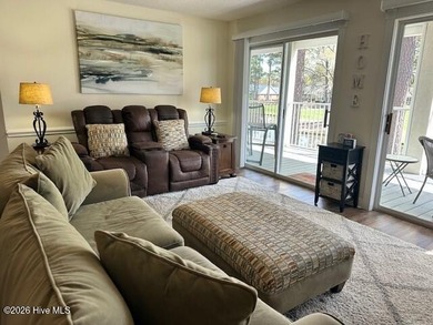Spacious, fully furnished 2BR/2BA second-floor center-unit condo on Brunswick Plantation and Golf Resorts in North Carolina - for sale on GolfHomes.com, golf home, golf lot
