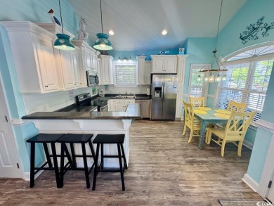 NEW LISTING! STUNNING 3 BED/2 BATH RAISED BEACH HOUSE WITH TONS on Prestwick Country Club in South Carolina - for sale on GolfHomes.com, golf home, golf lot