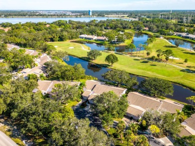 Spectacular pond framed by wide golf course views in The Meadows on The Meadows Golf and Country Club in Florida - for sale on GolfHomes.com, golf home, golf lot