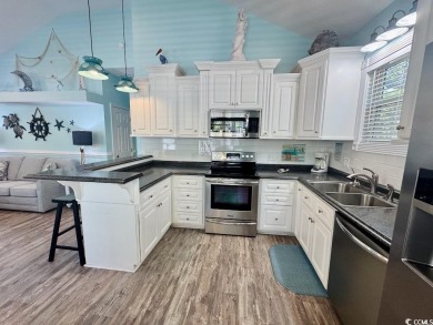 NEW LISTING! STUNNING 3 BED/2 BATH RAISED BEACH HOUSE WITH TONS on Prestwick Country Club in South Carolina - for sale on GolfHomes.com, golf home, golf lot