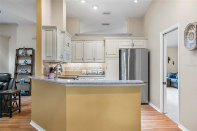 Welcome to this beautifully maintained 3-bedroom, 2-bath BLOCK on The Grand Club - Pine Lakes Course in Florida - for sale on GolfHomes.com, golf home, golf lot