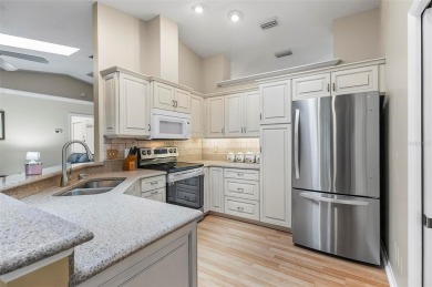 Welcome to this beautifully maintained 3-bedroom, 2-bath BLOCK on The Grand Club - Pine Lakes Course in Florida - for sale on GolfHomes.com, golf home, golf lot