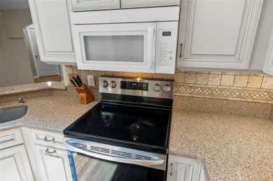 Welcome to this beautifully maintained 3-bedroom, 2-bath BLOCK on The Grand Club - Pine Lakes Course in Florida - for sale on GolfHomes.com, golf home, golf lot