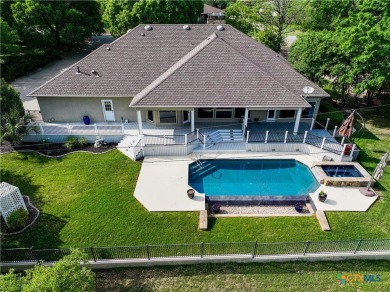 Four bedroom/four bath home with a game room overlooks Mill on Mill Creek Golf Club in Texas - for sale on GolfHomes.com, golf home, golf lot
