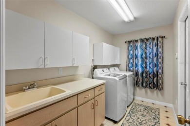 Welcome to this beautifully maintained 3-bedroom, 2-bath BLOCK on The Grand Club - Pine Lakes Course in Florida - for sale on GolfHomes.com, golf home, golf lot