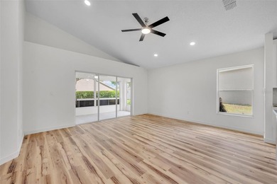 Welcome to this beautifully updated home in the sought-after on Kings Ridge Golf Club in Florida - for sale on GolfHomes.com, golf home, golf lot