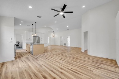 Welcome to this beautifully updated home in the sought-after on Kings Ridge Golf Club in Florida - for sale on GolfHomes.com, golf home, golf lot