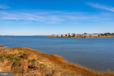 Discover waterfront living at its finest in this top floor, end on Bethany Bay Golf Club in Delaware - for sale on GolfHomes.com, golf home, golf lot