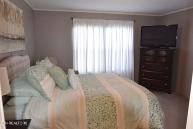 Welcome to this beautifully maintained 3-bedroom, 2-bath home on Woodlake Golf Club in Tennessee - for sale on GolfHomes.com, golf home, golf lot