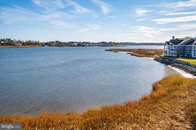 Discover waterfront living at its finest in this top floor, end on Bethany Bay Golf Club in Delaware - for sale on GolfHomes.com, golf home, golf lot