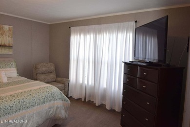 Welcome to this beautifully maintained 3-bedroom, 2-bath home on Woodlake Golf Club in Tennessee - for sale on GolfHomes.com, golf home, golf lot