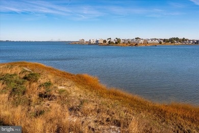 Discover waterfront living at its finest in this top floor, end on Bethany Bay Golf Club in Delaware - for sale on GolfHomes.com, golf home, golf lot