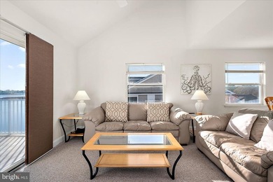 Discover waterfront living at its finest in this top floor, end on Bethany Bay Golf Club in Delaware - for sale on GolfHomes.com, golf home, golf lot