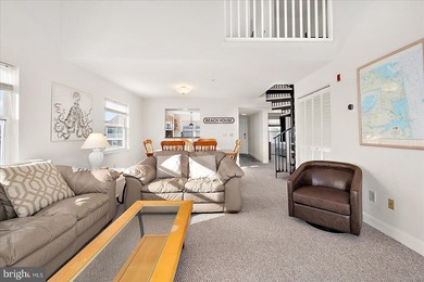 Discover waterfront living at its finest in this top floor, end on Bethany Bay Golf Club in Delaware - for sale on GolfHomes.com, golf home, golf lot